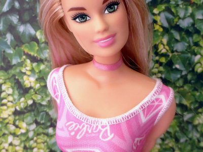 She's wondering what a big Ken has in his pants