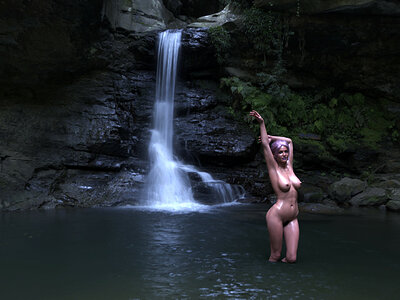 Vic refreshes herself at the waterfall.jpg